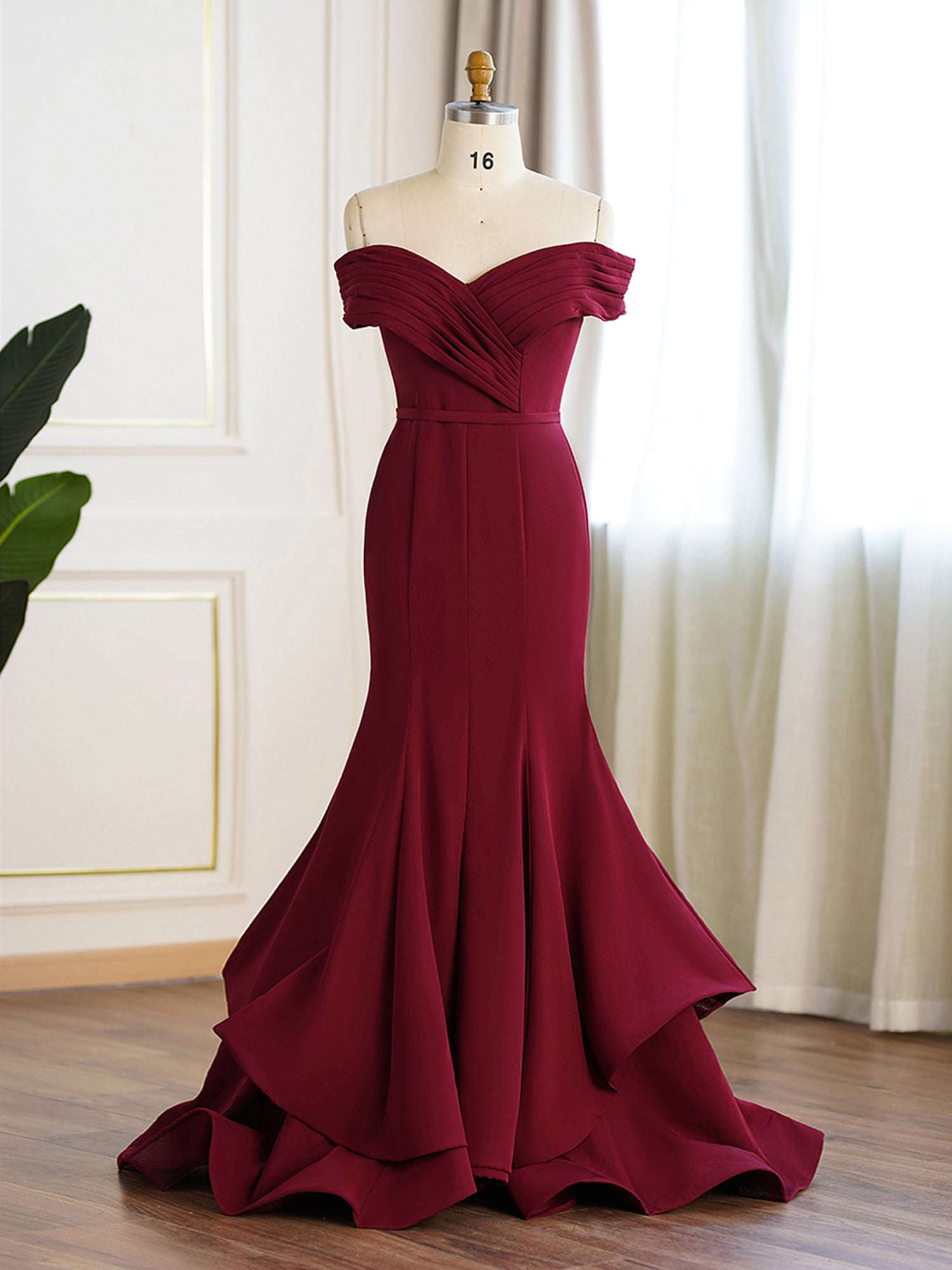 Off the deals shoulder trumpet gown